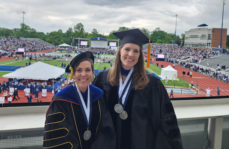 Dr. Virginia Smith (left) and Dr. Kristin Sample-Lord (right) at Villanova's graduation ceremony.